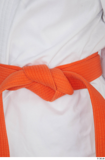 Selin dressed jiu-jitsu kimono orange belt sports upper body 0009.jpg